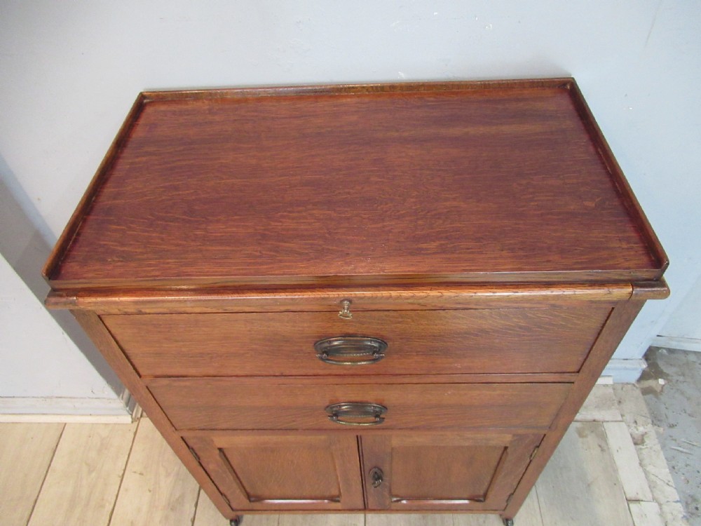 Oak 1920s  side cabinet  with slide shelf View VIII