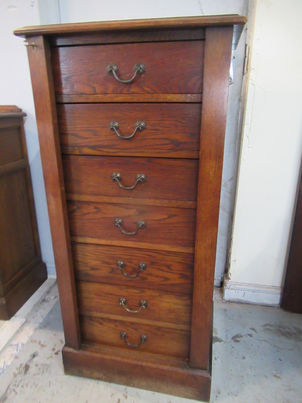 Edwardian period oak  Wellington chest of drawers