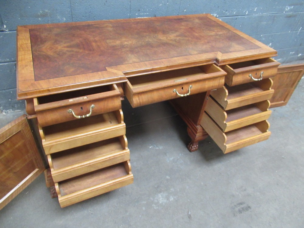 Walnut and burr walnut knee hole desk 