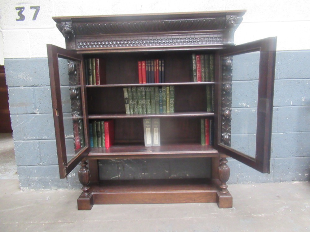 Victorian  carved  oak two door bookcase