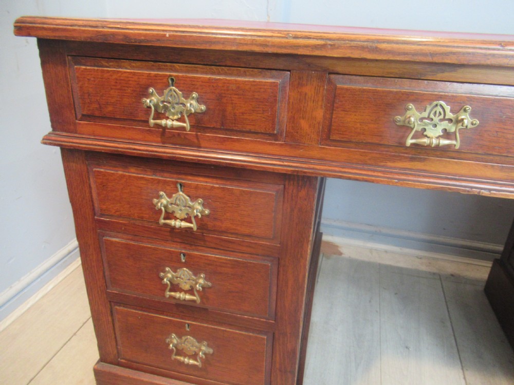 Late Victorian period oak knee hole desk View IV