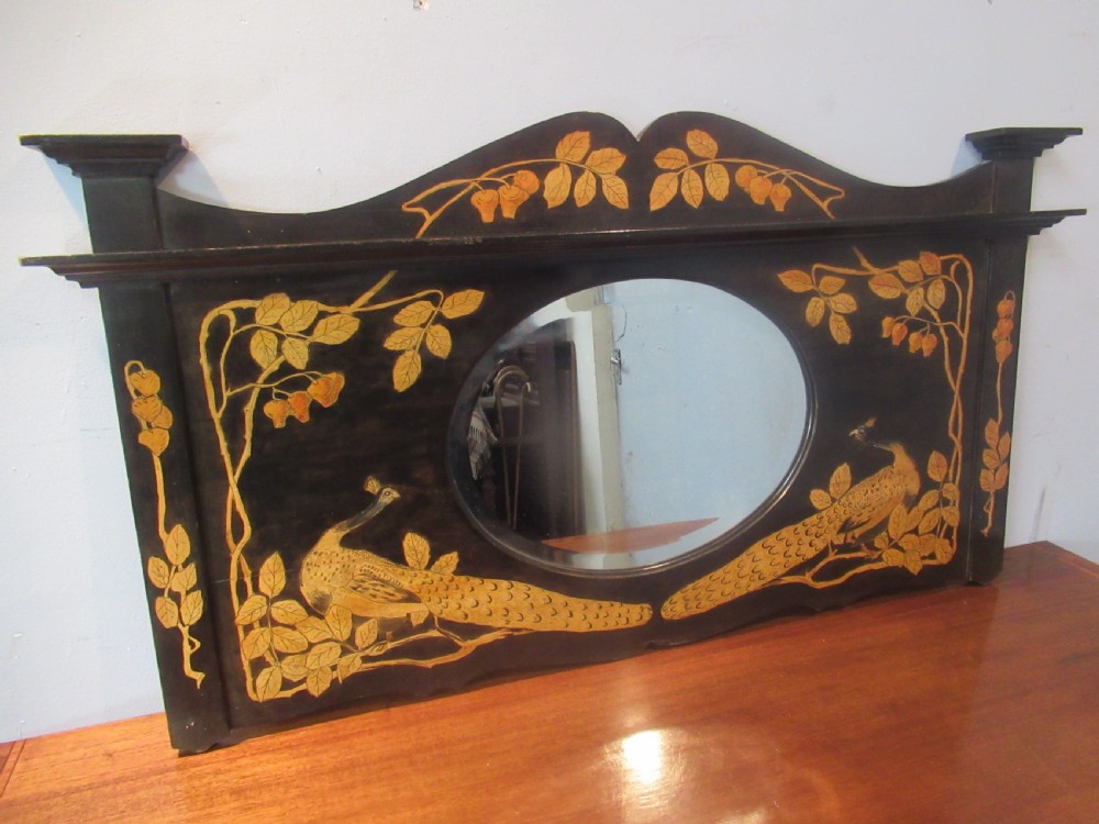 Wall mirror  in  a decorated frame View II