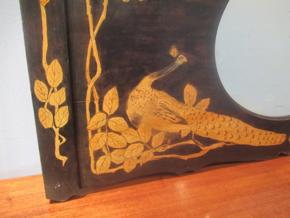 Wall mirror  in  a decorated frame View V