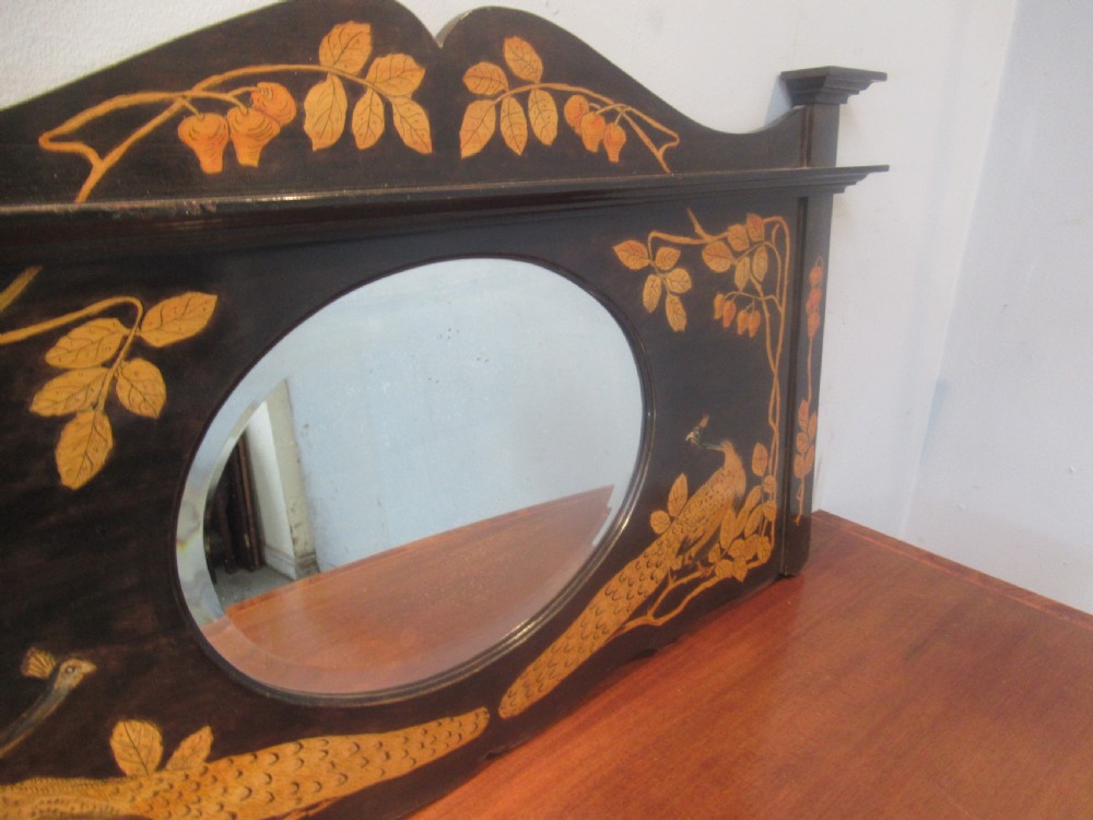 Wall mirror  in  a decorated frame View VI