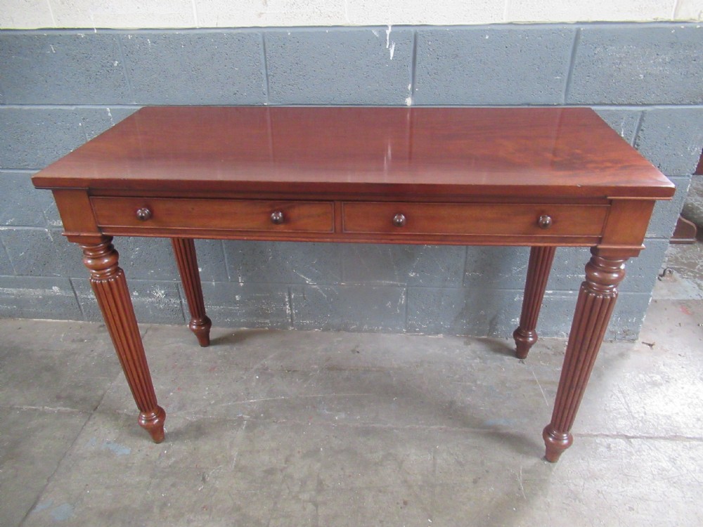 Good   19th century     tall mahogany side or hall table 