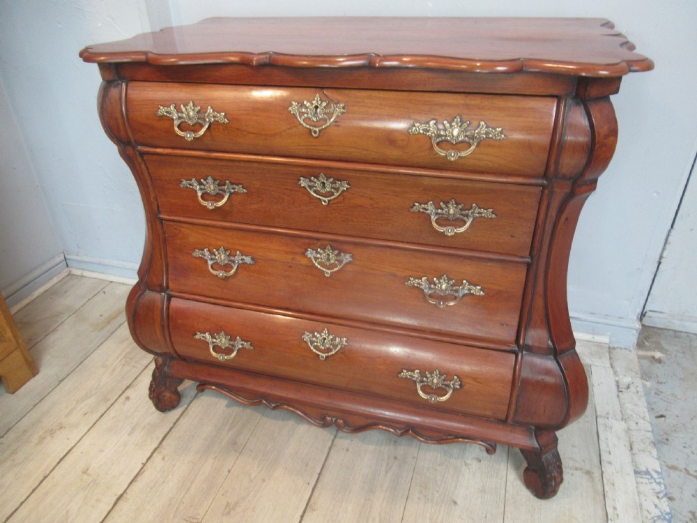 Late 19th century   walnut Bombe shaped chest of drawers