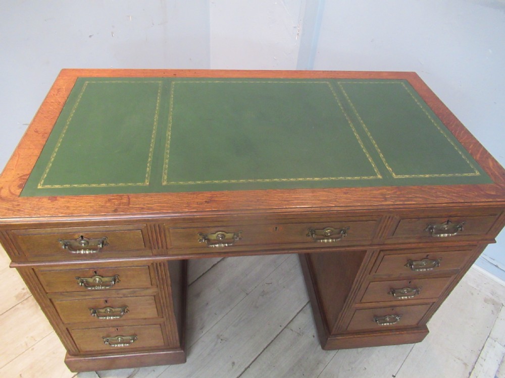 Edwardian  period oak knee hole desk