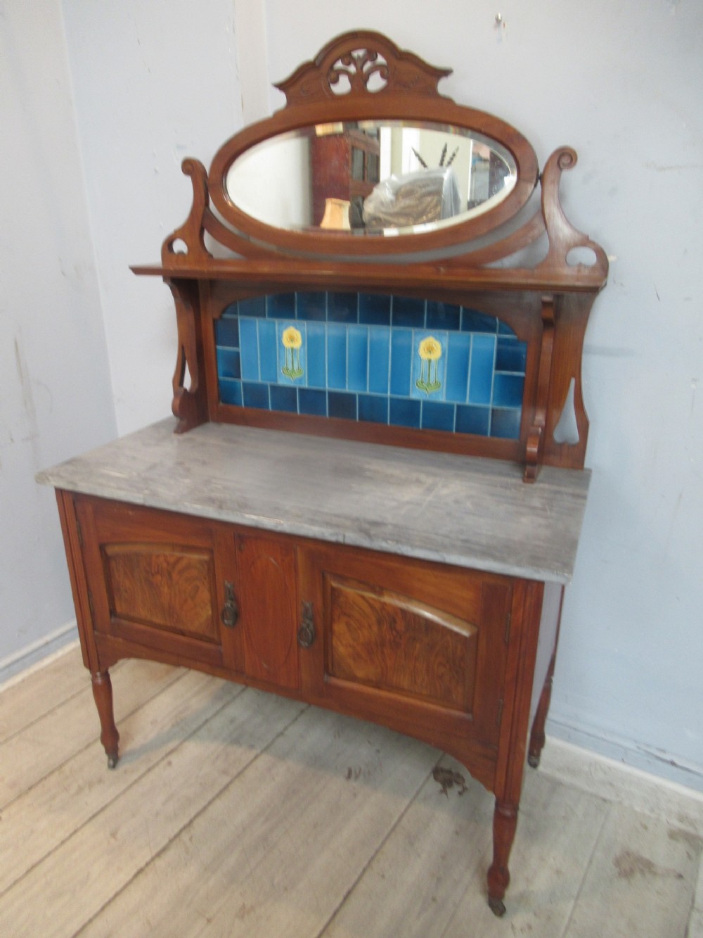 Marble and tile back washstand   1900s.
