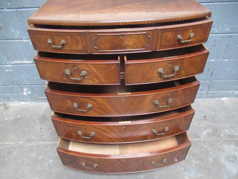 Good mahogany bow front  chest of drawers in the antique style. View VIII