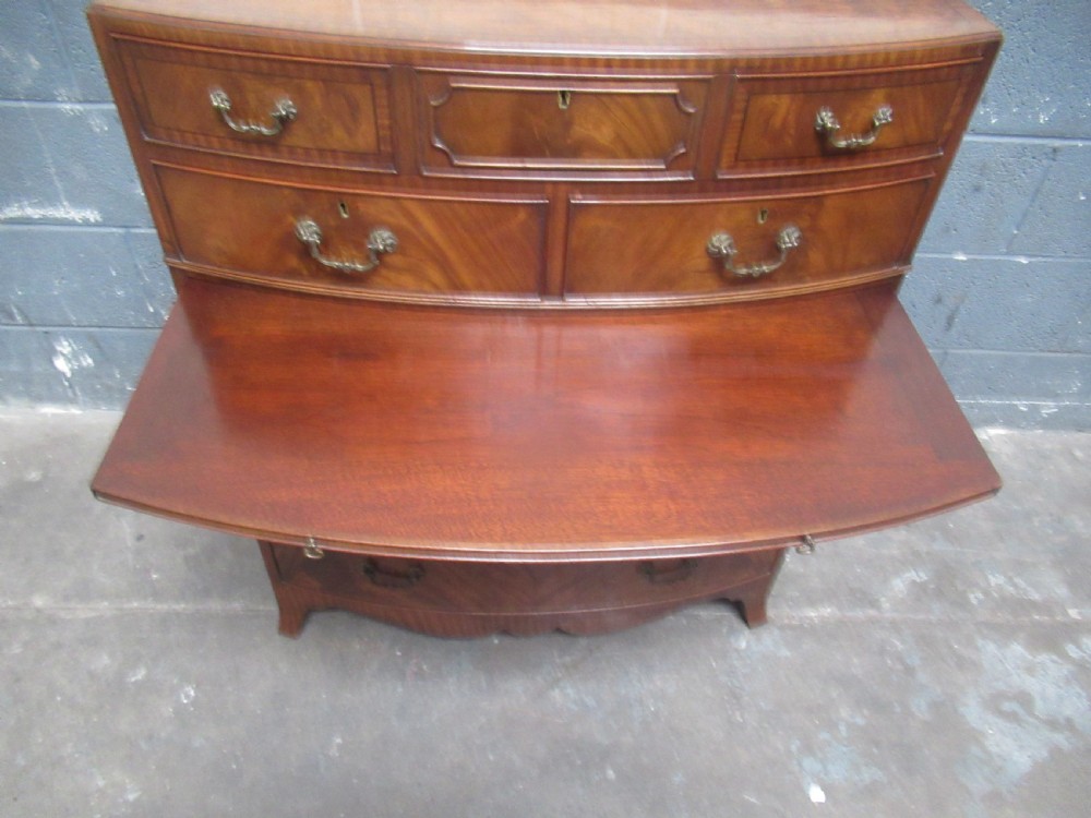 Good mahogany bow front  chest of drawers in the antique style. View XI