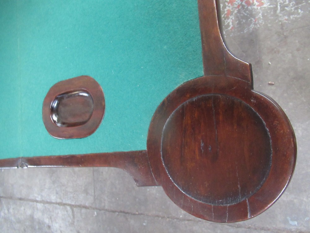 A Georgian mahogany fold-over card table featuring carved cabriole legs with acanthus knees and claw and ball feet. View XIII