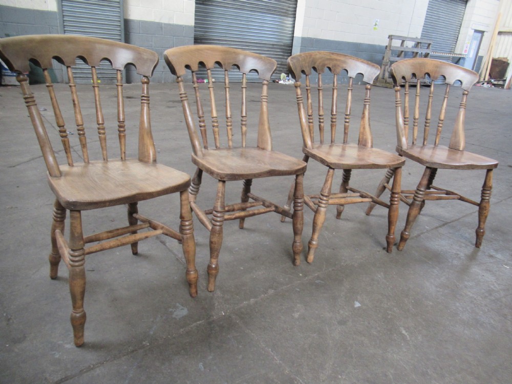A set of four  late Victorian kitchen dining chairs