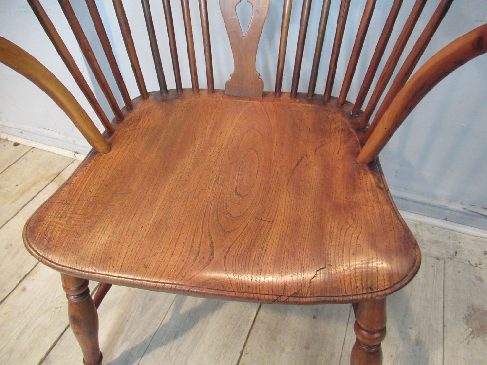 A 19th century   Yew wood Windsor arm chair  View III