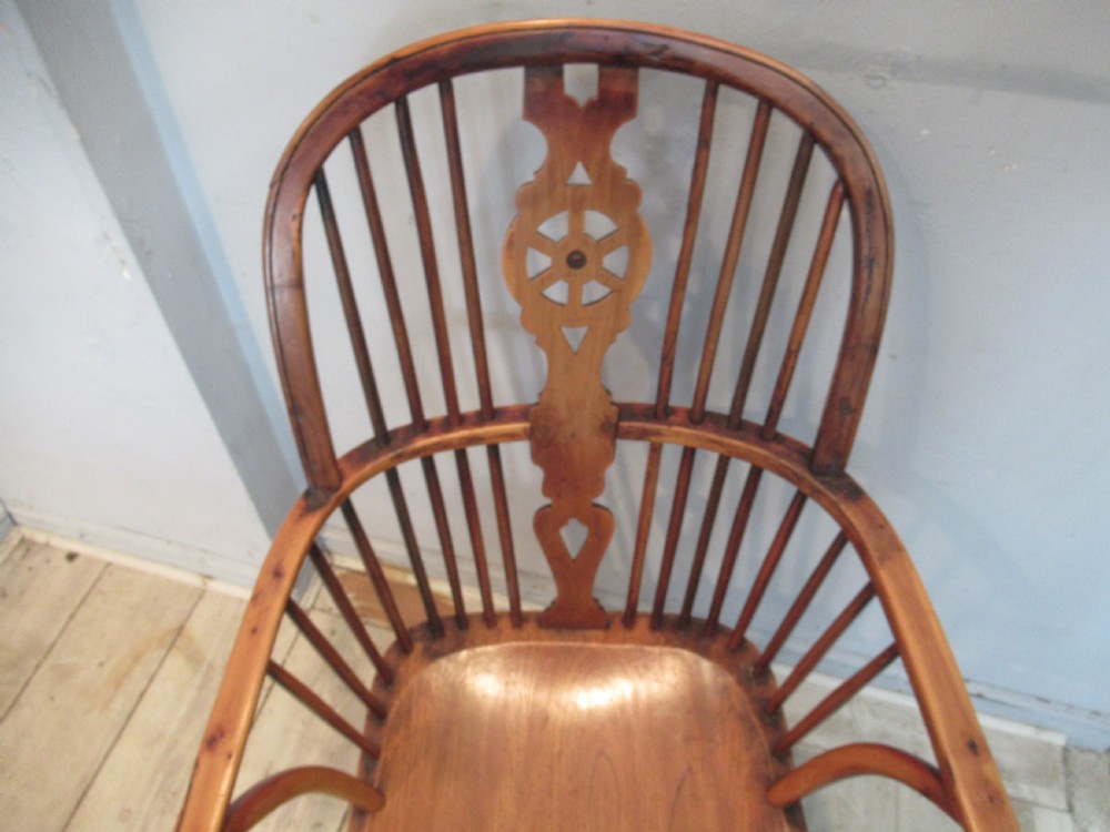 A 19th century   Yew wood Windsor arm chair  View IV