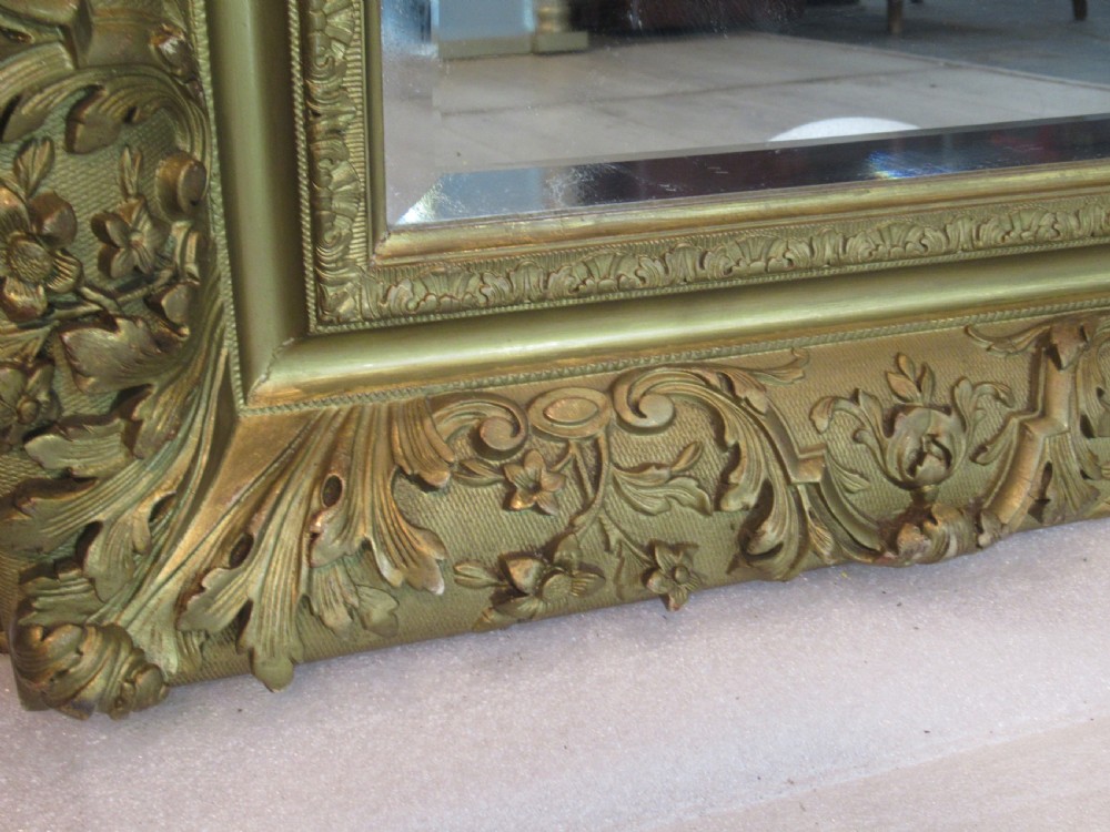 A large 1900s    deep gilt framed wall mirror  View V