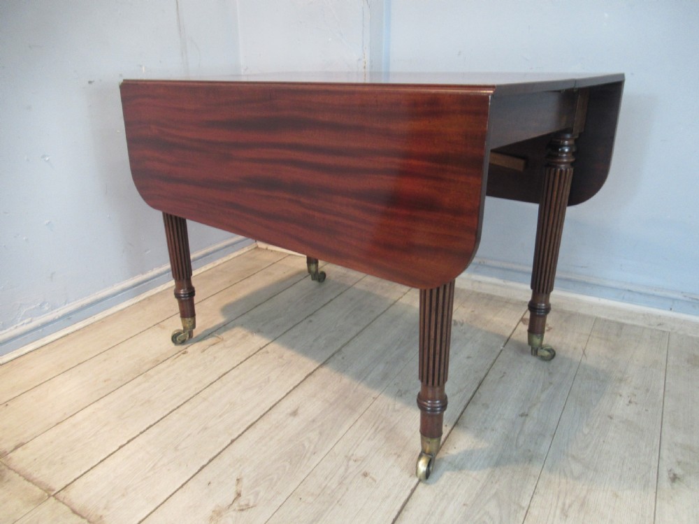 Regency drop leaf extending mahogany dining table  View III