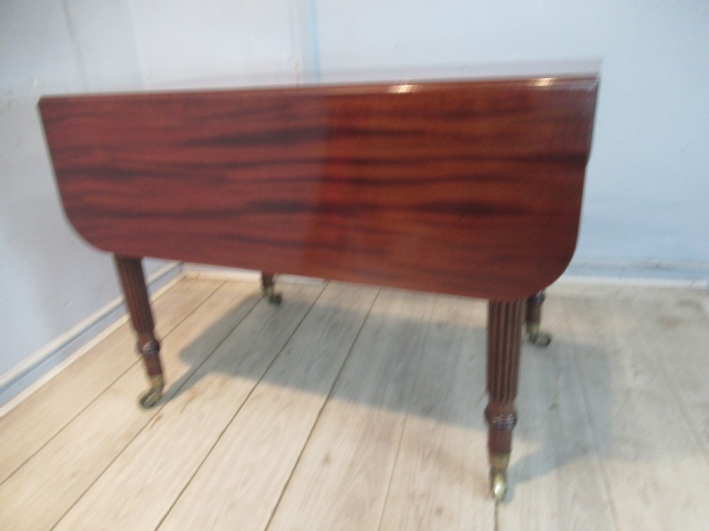 Regency drop leaf extending mahogany dining table  View V