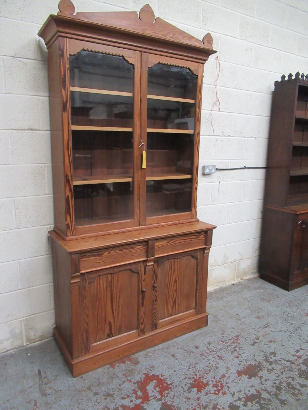 A Victorian 1880s pitch pine cupboard  bookcase