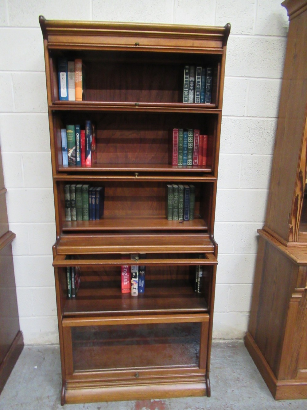 Tall mahogany stacker type bookcase