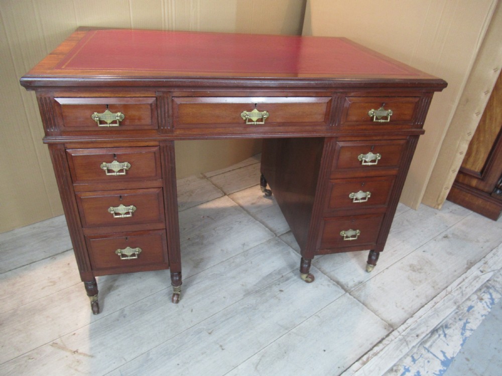 Small size Late Victorian mahogany knee hole desk