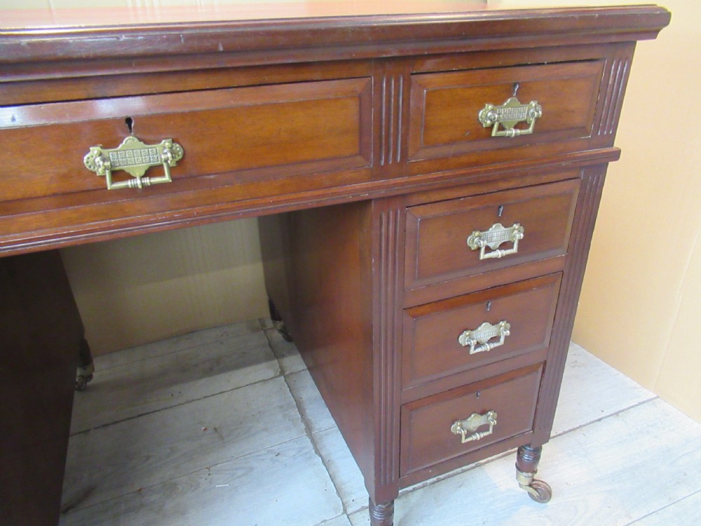 Small size Late Victorian mahogany knee hole desk View VIII
