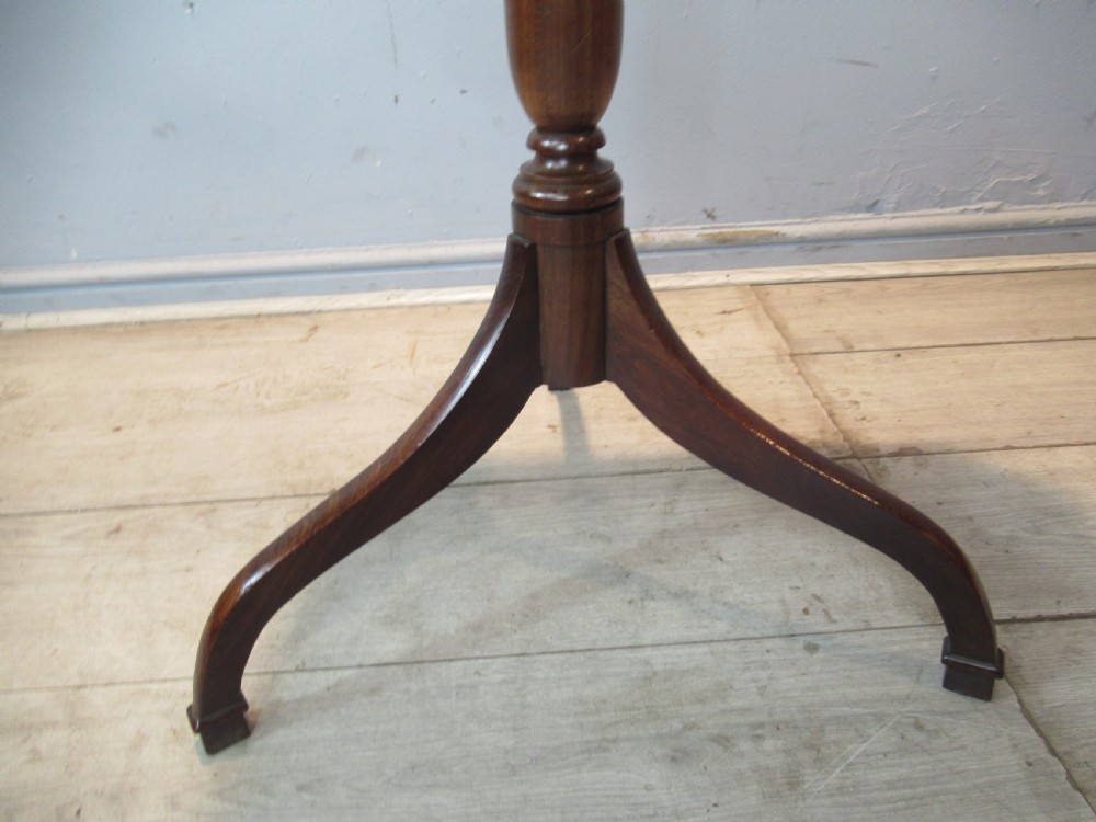 A 19th-century mahogany tripod side table featuring a clipped-corner top, turned central column, and three splayed legs. View VIII