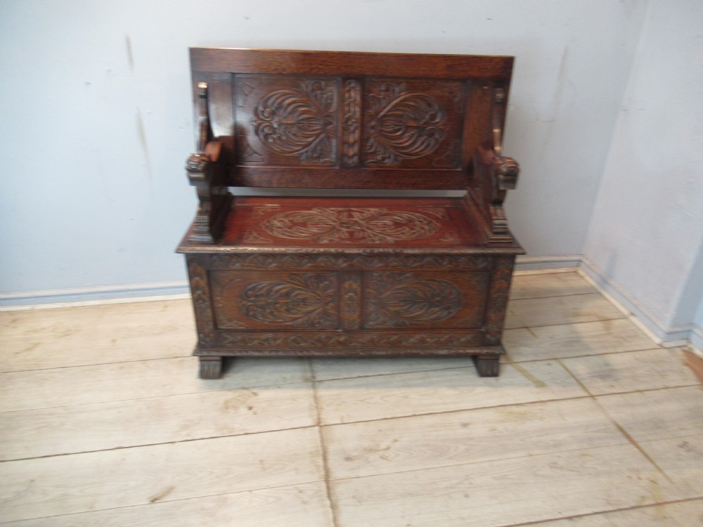 A carved oak monks bench seat   1920 View III