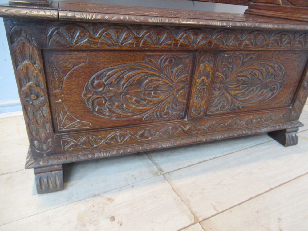 A carved oak monks bench seat   1920 View IV