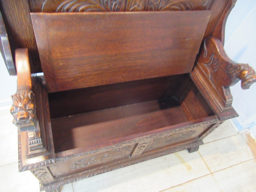 A carved oak monks bench seat   1920 View XI
