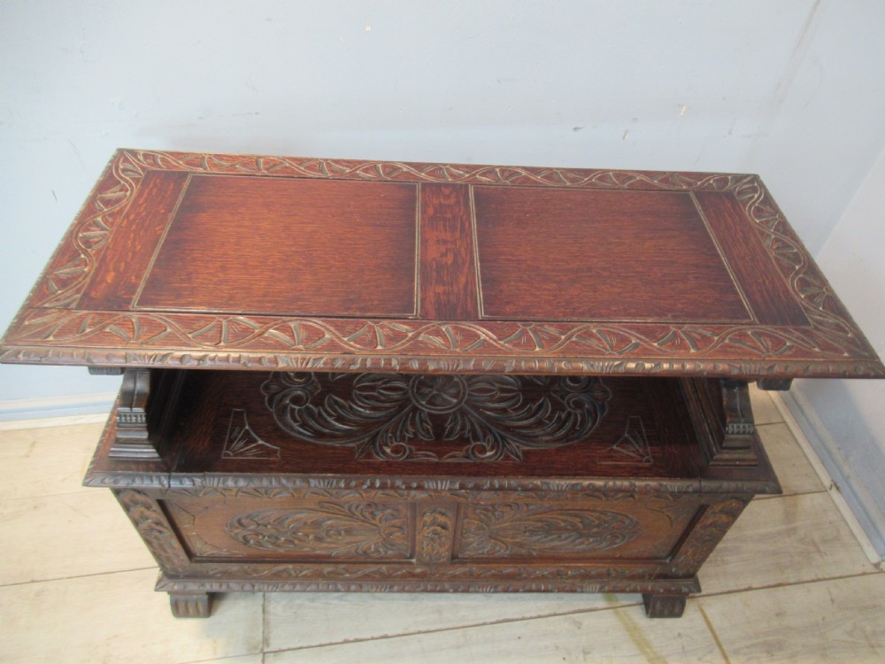 A carved oak monks bench seat   1920 View XIII