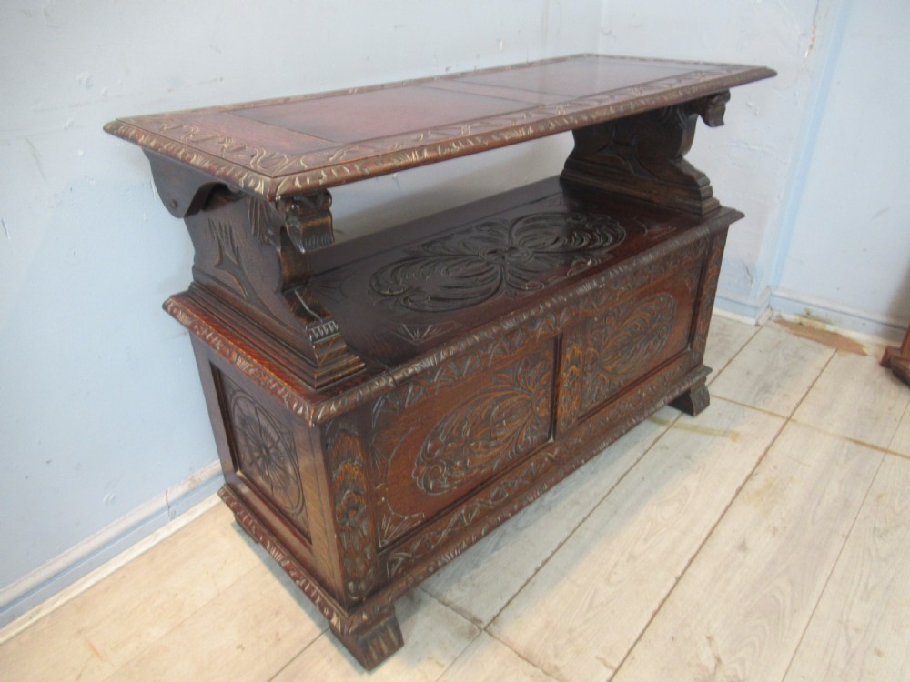 A carved oak monks bench seat   1920 View XVI