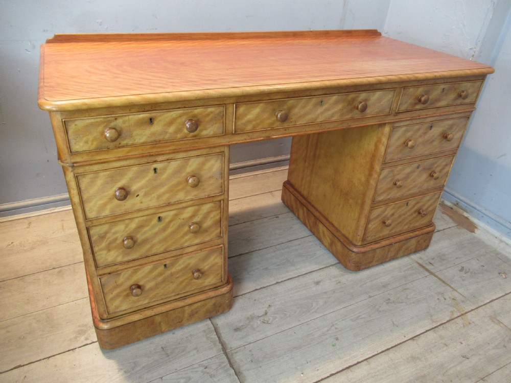 A Victorian 1870s    satin birch knee hole desk