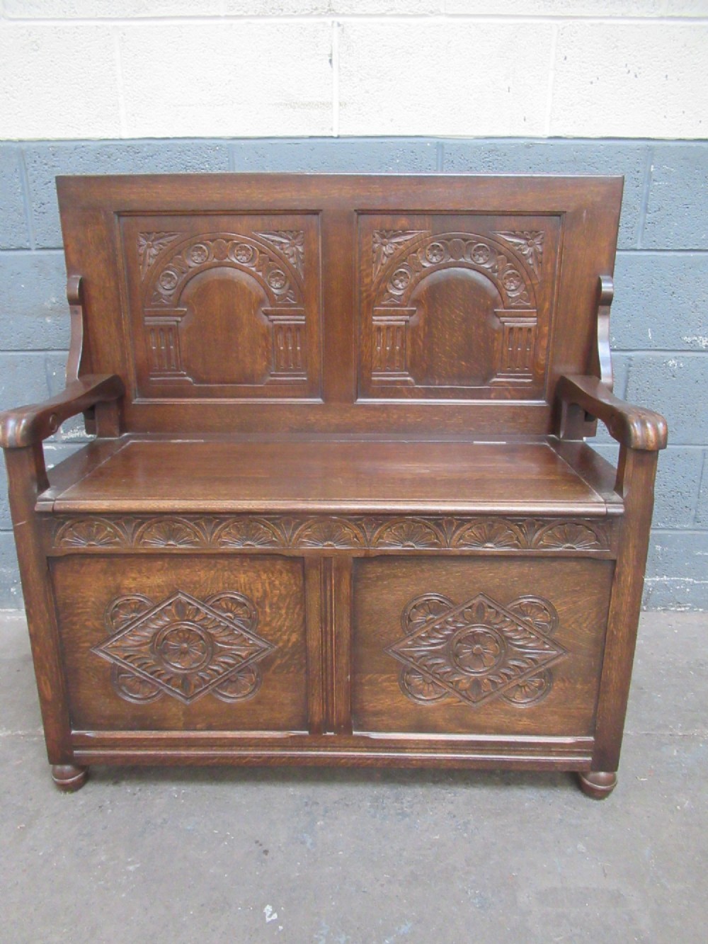 A 1920s  oak Monks bench seat