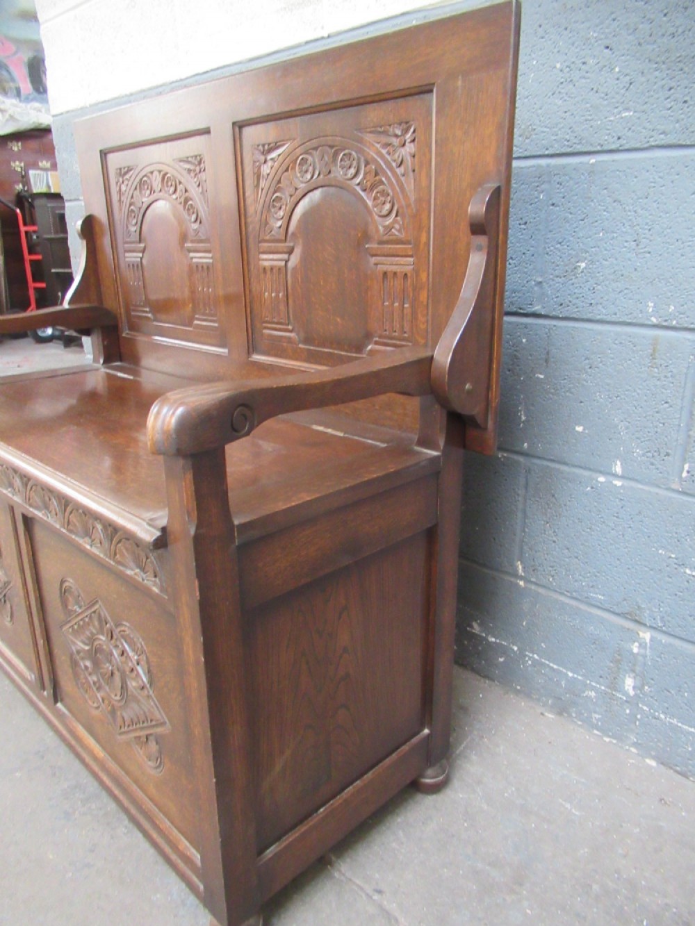 A 1920s  oak Monks bench seat View IX