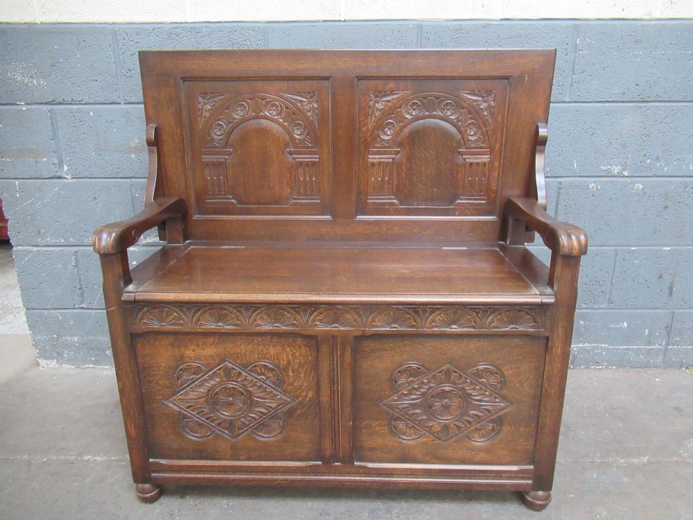 A 1920s  oak Monks bench seat View XI