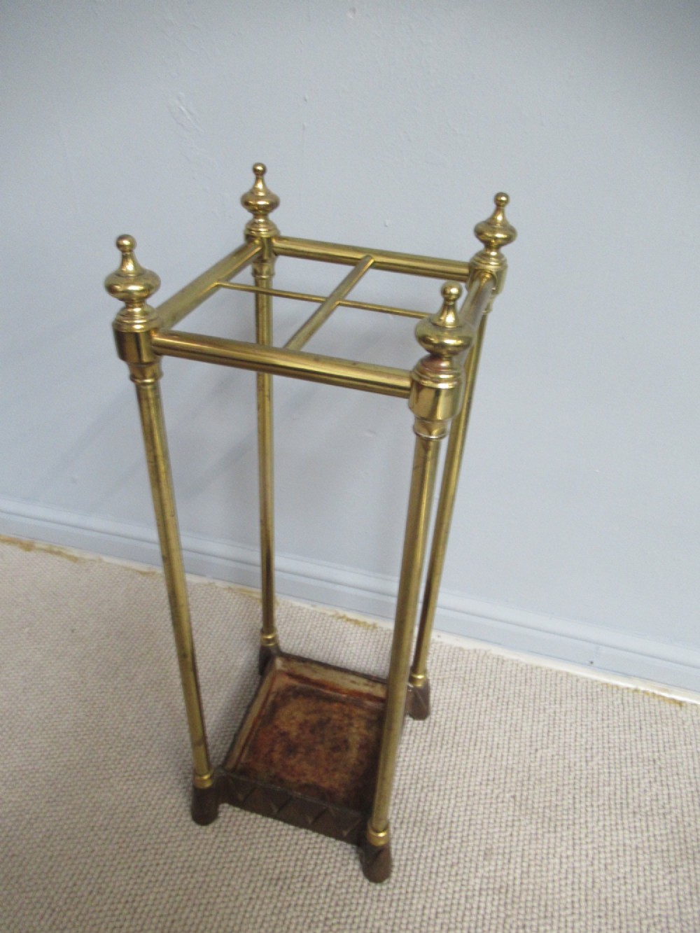 A    brass and cast iron       1900s walking stick stand. View III