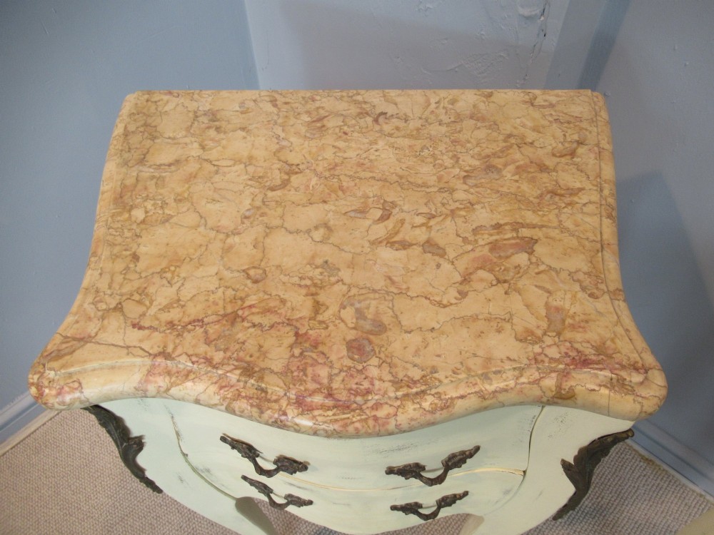 A pair of cream painted French style bedside cabinets featuring variegated marble tops, two drawers with brass handles, and slender cabriole legs. View III