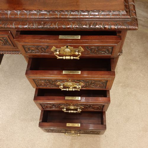 A FINELY CARVED PANELLED MAHOGANY PEDESTAL DESK - ADDITIONAL PHOTO 3