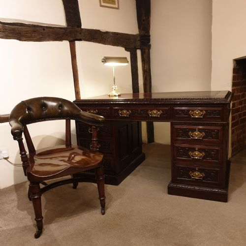 A FINELY CARVED PANELLED MAHOGANY PEDESTAL DESK - ADDITIONAL PHOTO 8