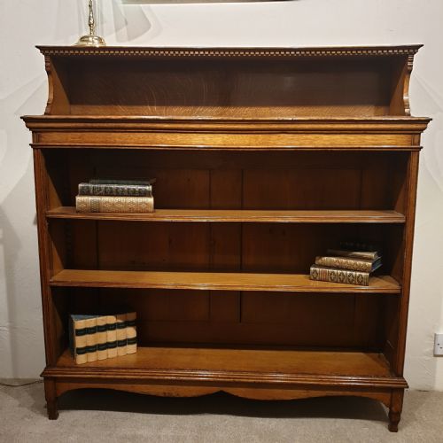 a golden oak open bookcase - CATEGORY: ANTIQUE BOOKCASES - DATED 1890