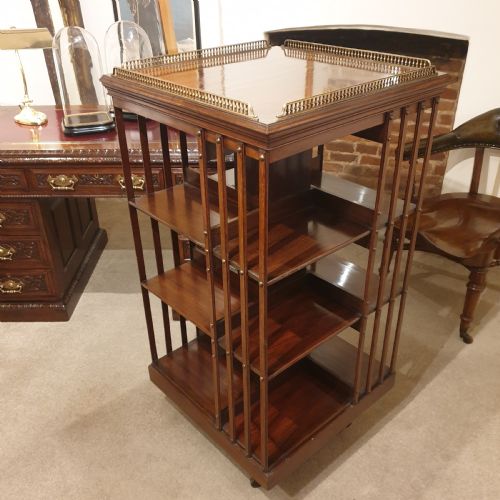 A MAHOGANY REVOLVING LIBRARY BOOKCASE WITH GALLERIED TOP - ADDITIONAL PHOTO 1