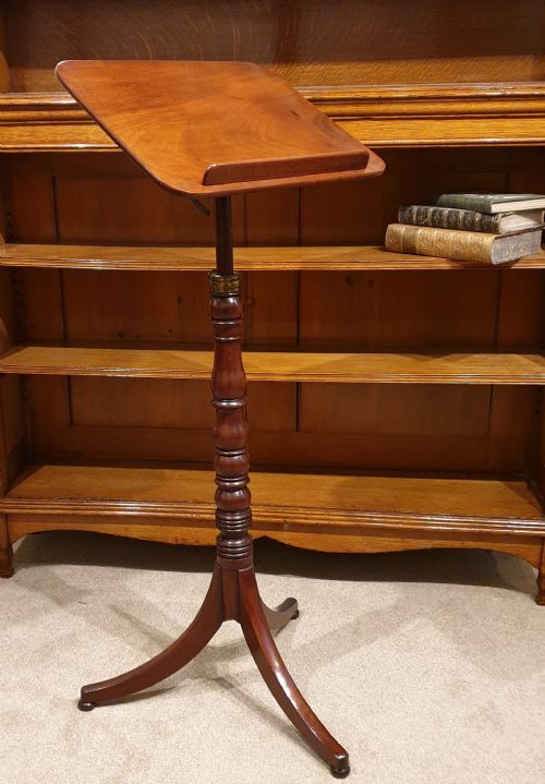 an adjustable mahogany occassional or reading table - CATEGORY: ANTIQUE TABLES - DATED 19TH CENTURY