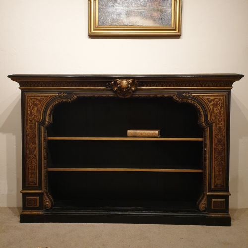an ebonised open bookcase with gilded faux boulle decoration - CATEGORY: ANTIQUE BOOKCASES - DATED 1860