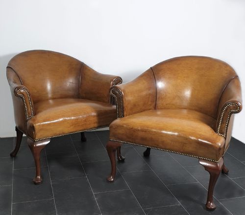 pair of leather tub chairs - CATEGORY: ANTIQUE CHAIRS - DATED 1920