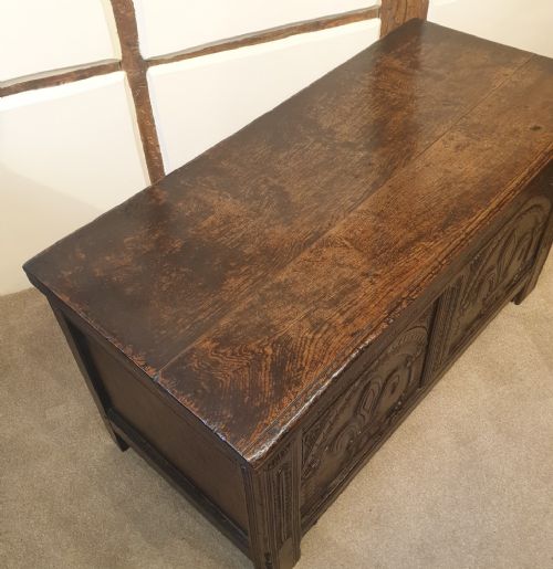 MID 17TH CENTURY OAK COFFER WITH ORIGINAL FEUR DE LIS CARVED DECORATION - ADDITIONAL PHOTO 1