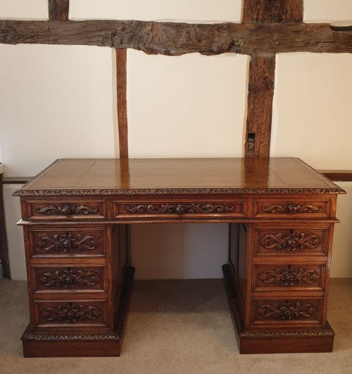 a fine panelled oak pedestal desk by wetson thexton of tottenham court road london - CATEGORY: ANTIQUE DESKS - DATED 1880