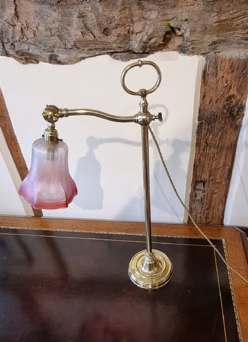AN ANTIQUE BRASS RISE FALL STUDENTS DESK LAMP WITH DECORATED RUBY GLASS SHADE - ADDITIONAL PHOTO 2