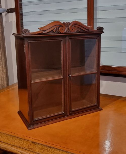 a miniature mahogany tabletop glazed cabinet circa 1830 - CATEGORY: ANTIQUE CABINETS - DATED 19TH CENTURY