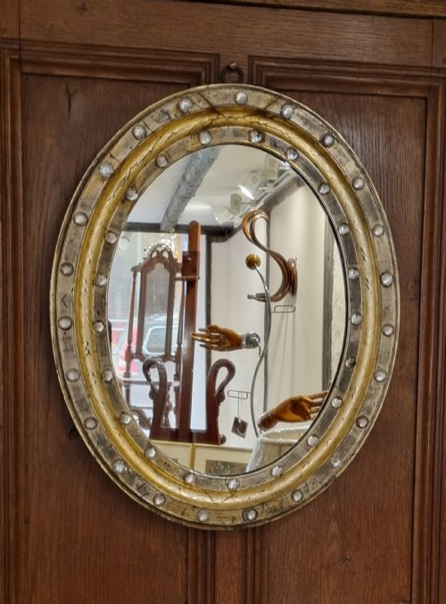 A 19TH CENTURY IRISH GILT EMBOSSED OVAL WALL MIRROR - ADDITIONAL PHOTO 7