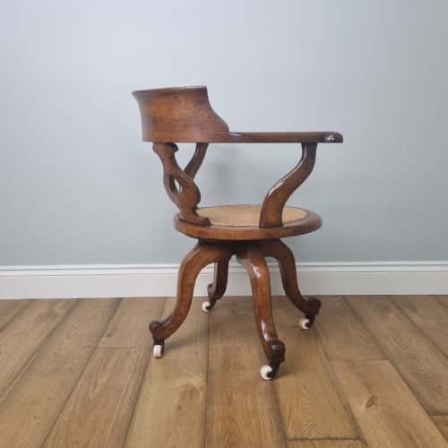 AN OAK SWIVEL DESK CHAIR WITH HEART SHAPED BACK - ADDITIONAL PHOTO 7